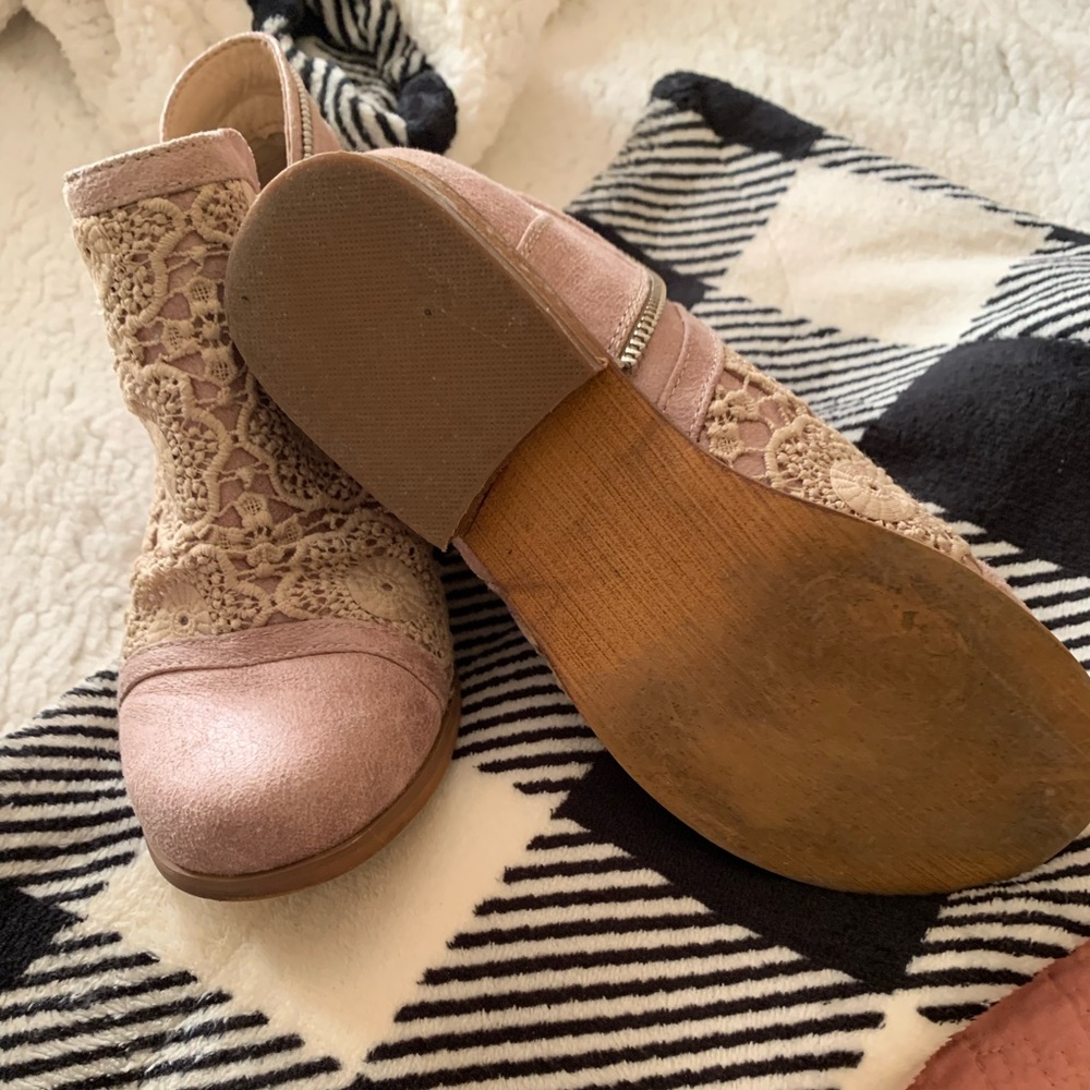 Cute lace on top of these ankle boots. Outside zipper. Like new, rounded toe